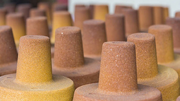 Foundry resin-coated sand
