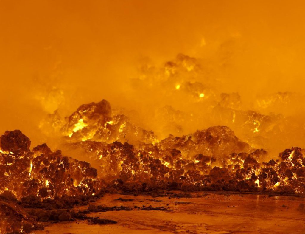 Molten Aluminum inside a furnace. Shallow depth of field.